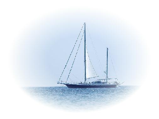 A ketch out on the ocean
on a sunny day